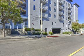 Los Angeles apartment for rent - A street view of a multi-story building named Castella Apartments.