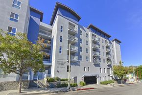 Los Angeles apartment for rent - The image shows a multi-story building with the name "Castellar" on it.