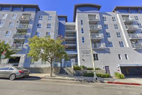 Los Angeles apartment for rent - A modern apartment building with a sign that reads "Castella".