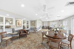 Edgewater apartment for rent - Community room with dining tables and ceiling fans at Victoria Park at Edgewater Apartments, Edgewater