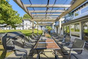 Duarte apartment for rent - Covered outdoor dining area with pergola shade at Heritage Park Apartments, California