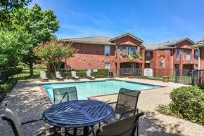 Irving apartment for rent - Pool With Relaxing Chairs at Cooper's Crossing, Irving, Texas