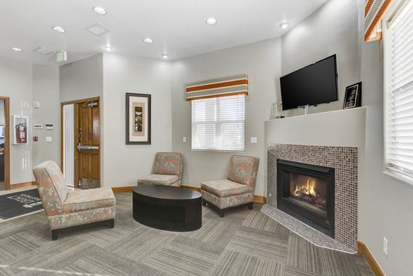 Denver apartment for rent - Community Room with Fireplace at Fox Crossing Apartments, Denver, CO, 80231