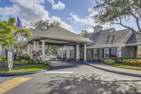 Kissimmee apartment for rent - Covered walkway entrance at Wellington Woods Apartments, Kissimmee