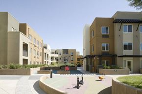 New York apartment for rent - A playground area in front of apartment buildings.