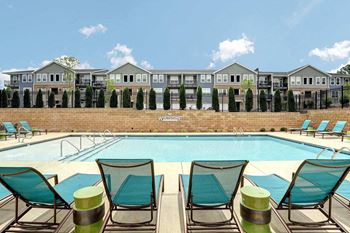 Swimming pool with lounge chairs