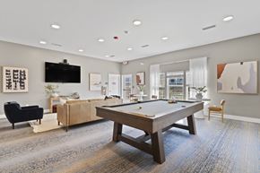 Foley apartment for rent - A room with a pool table and a tv.