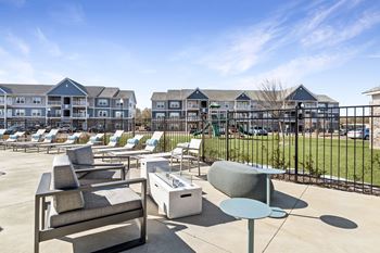 Sparkling pool with sundeck and firepit