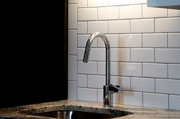Basin with designed tiles