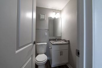Bathroom with basin and cupboard