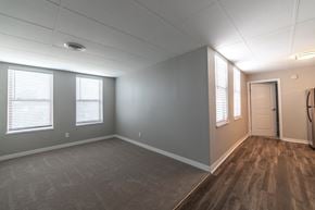 Indianapolis apartment for rent - Open living room with windows at The Argyle on Mass Ave, Indiana, 46202