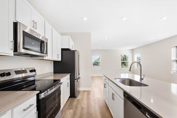 Kitchen with black appliances