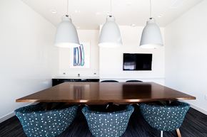 Indianapolis apartment for rent - Conference Room With TV at The Congress at Library Square, Indianapolis, IN, 46204