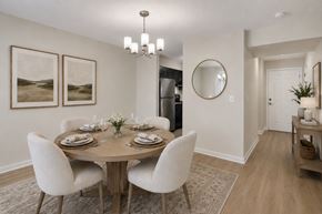 Nashville apartment for rent - A dining room with a round table set for six.