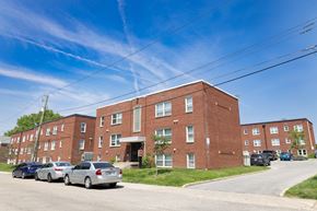 Indianapolis apartment for rent - Street view of Monon Court Apartments Broad Ripple offering affordable one- and two-bedroom floor plans with easy Monon Trail access.