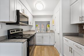 Indianapolis apartment for rent - Modern galley kitchen at Monon Living, Indianapolis