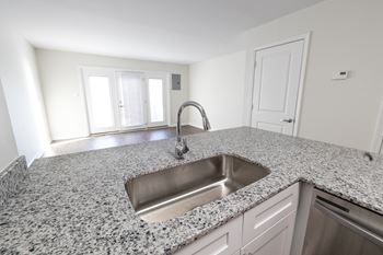 Stainless steel sink with faucet