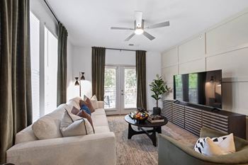 A living room with a couch and a tv