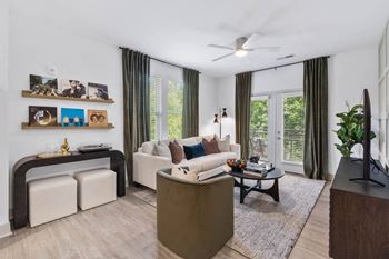 A living room with a couch and a table