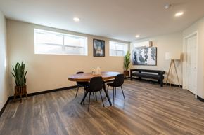 Indianapolis apartment for rent - a dining room with a wooden table and chairs