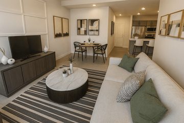 Carmel apartment for rent - A living room with a white couch and a coffee table.
