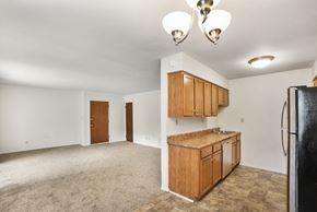 Marion apartment for rent - Open living room to kitchen layout at Somerset Apartments in Marion, IN.