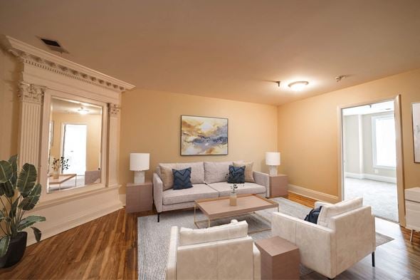 Indianapolis apartment for rent - Staged living room at The Plaza at Library Square Apartments, 902 N. Pennsylvania Street, Indianapolis