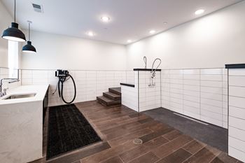 A large bathroom with a shower and sink