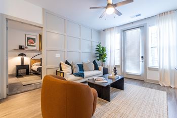 A living room with a couch and a coffee table
