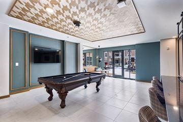 Carmel apartment for rent - A room with a pool table and a television.