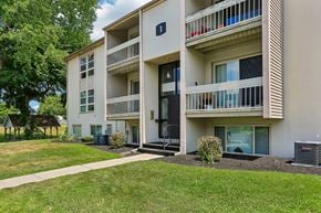 Lebanon apartment for rent - Apartment building with a green lawn in front.