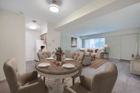 Lebanon apartment for rent - A dining room with a round table set for six.