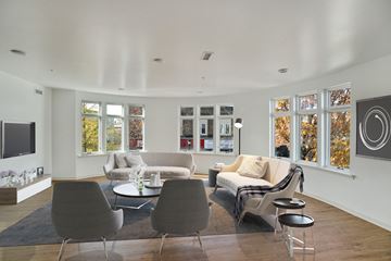 Philadelphia apartment for rent - a living room with couches and chairs and a television