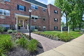 Doylestown apartment for rent - A brick building with a sign that says "Centre" in front of it.