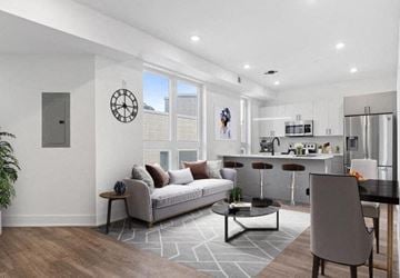 Philadelphia apartment for rent - a living room with a couch and a kitchen