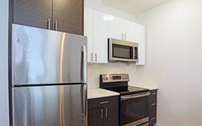 Philadelphia apartment for rent - a kitchen with stainless steel appliances and a refrigerator