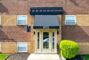 Philadelphia apartment for rent - The front of a brick building with the number 8112 on it.