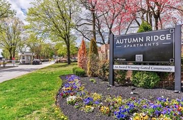 Blackwood apartment for rent - A sign for Autumn Ridge Apartments is displayed in front of a flower bed.