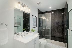 Philadelphia apartment for rent - a bathroom with a shower and a sink and a toilet
