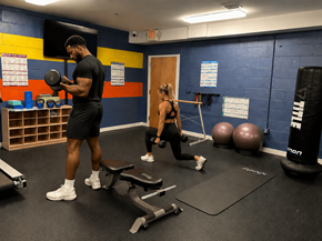 Blackwood apartment for rent - A man and a woman are exercising in a gym.