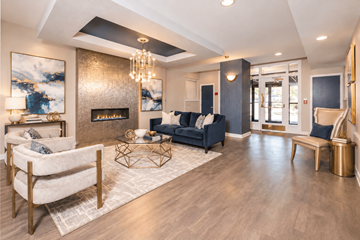 Philadelphia apartment for rent - A modern living room with a fireplace and a large painting on the wall.