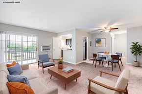 Camp Hill apartment for rent - A living room with a sofa, chairs, and a dining table.
