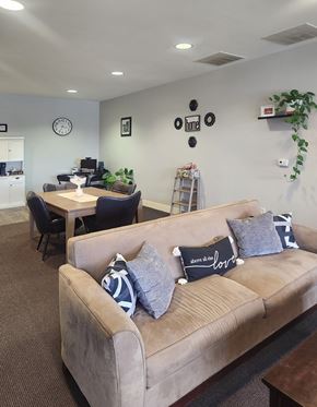 Lemoyne apartment for rent - A living room with a couch, chairs, and a dining table.