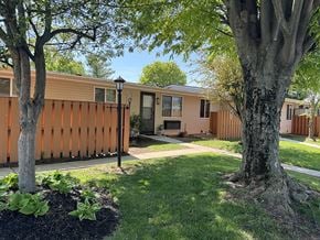 York apartment for rent - Shady trees and neat landscaping at Sunset Ridge Apartments.