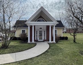 Camp Hill apartment for rent - A house with a front porch and a walkway leading to the front door.