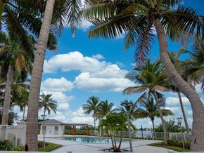 Oakland Park apartment for rent - Pool area with lounge chairs at Aqua 2800, Oakland Park