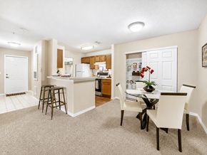 Orlando apartment for rent - A kitchen with a dining table and chairs.