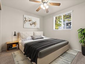 Reno apartment for rent - A bedroom with a large bed and a ceiling fan at ALTITUDE BY VINTAGE, Reno, NV, 89523