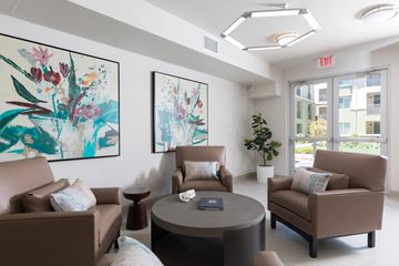 Antioch apartment for rent - A living room with two couches, a coffee table, and two paintings on the wall.