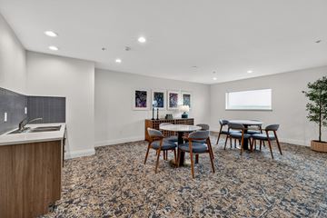 Everett apartment for rent - A dining room with a table set for six.